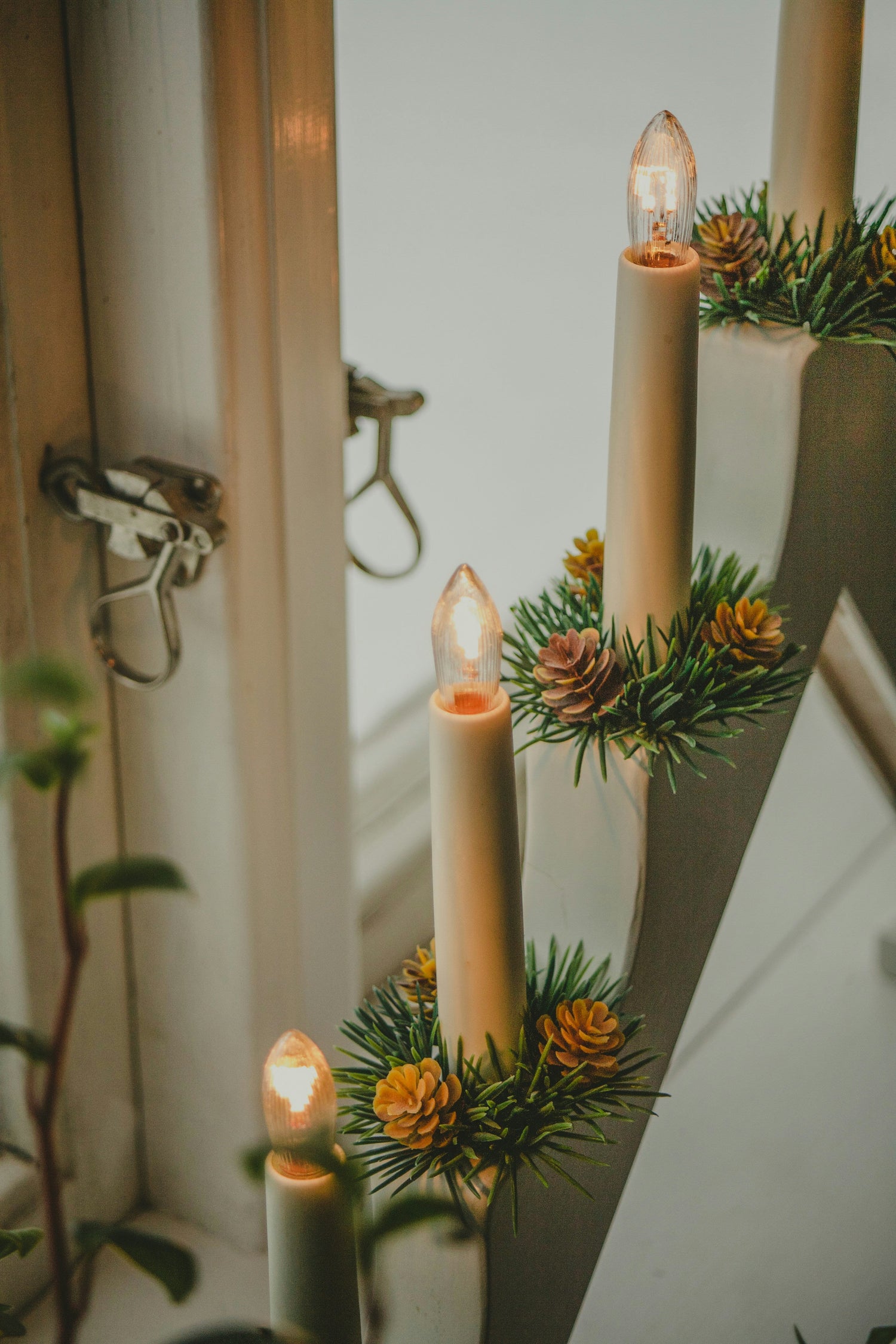 Holiday table set with seasonal flower candle holders